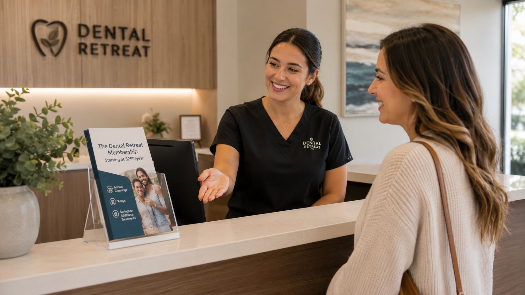 A friendly dental receptionist greeting a patient at the front desk with a membership brochure nearby.